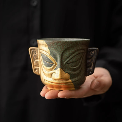 Sanxingdui Gold Mask Ceramic Teacup – Inspired Heritage Drinkware | Zen Ara Grove