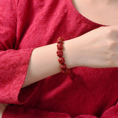 Cinnabar Buddha Head Prayer Bead Bracelet