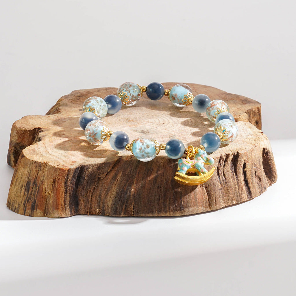 LIMITED TIME OFFER-Handcrafted Blue Agate and Luminous Glass Bead Bracelet –  A Symbol of Joy and Protection | Zen Ara Grove