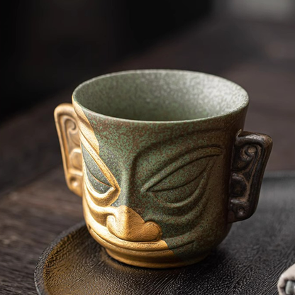 Sanxingdui Gold Mask Ceramic Teacup – Inspired Heritage Drinkware | Zen Ara Grove