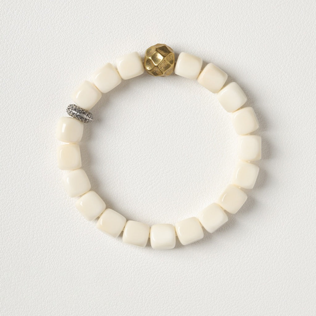 White Bodhi Seed Talisman | Hammered Birth-Buddha Amulet | Zen Ara Grove