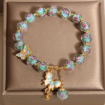 Blue Rose Garden Butterfly Pendant Glass Bracelet | Zen Ara Grove