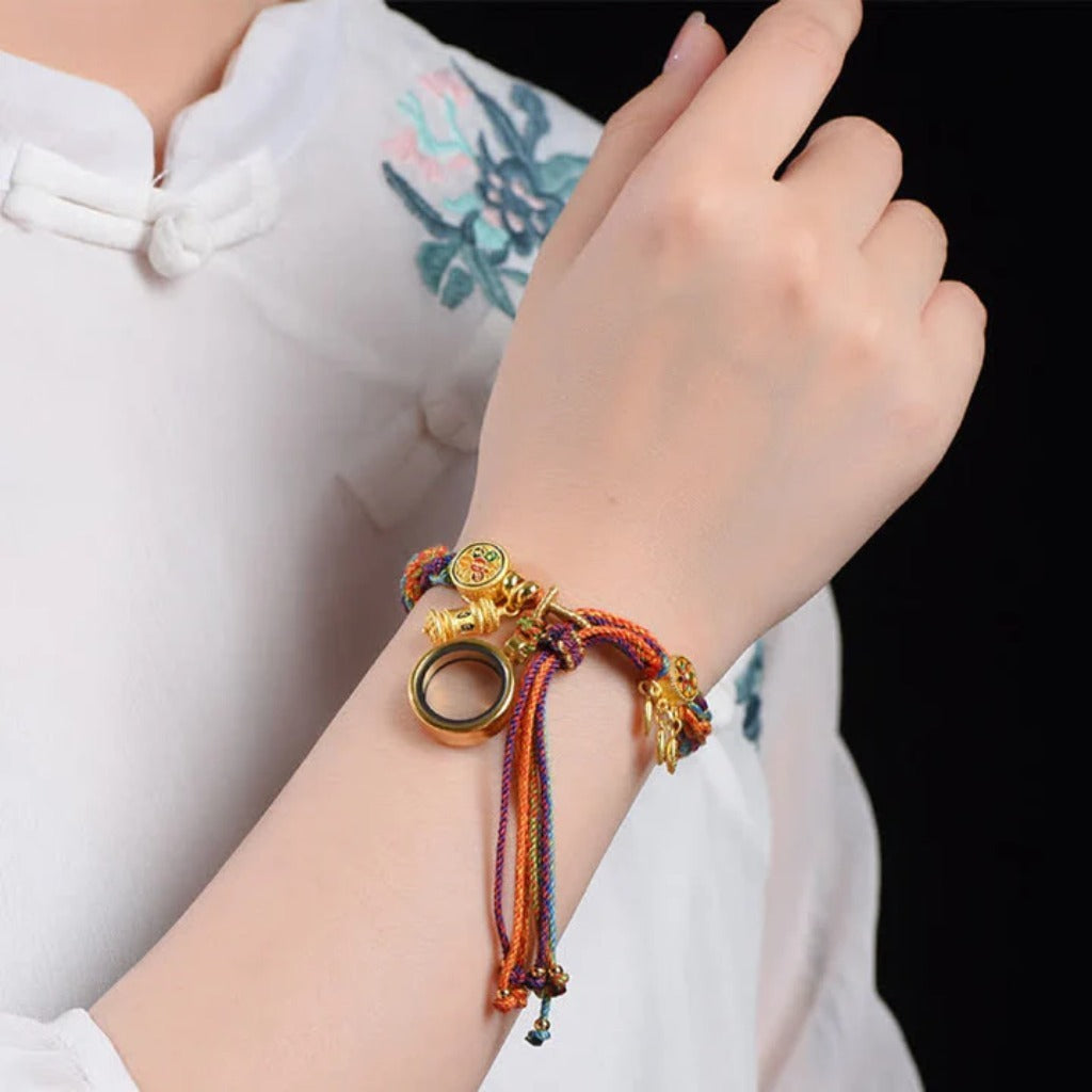 Spin Your Luck Bracelet: Handwoven Color Strings with Secret Charms