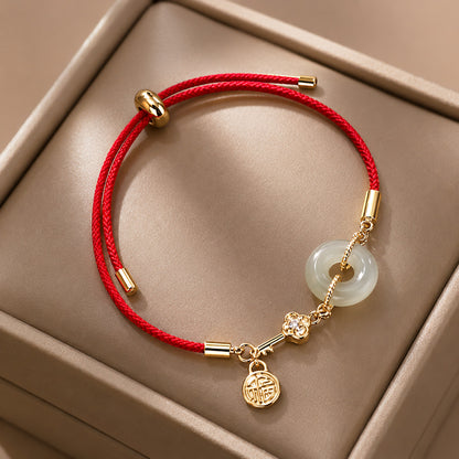 Adjustable Red Cord Bracelet with Hetian Jade Peace Buckle and Key Charm — Blessing & New Beginnings